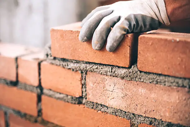 I will build and repair brick walls and chimneys