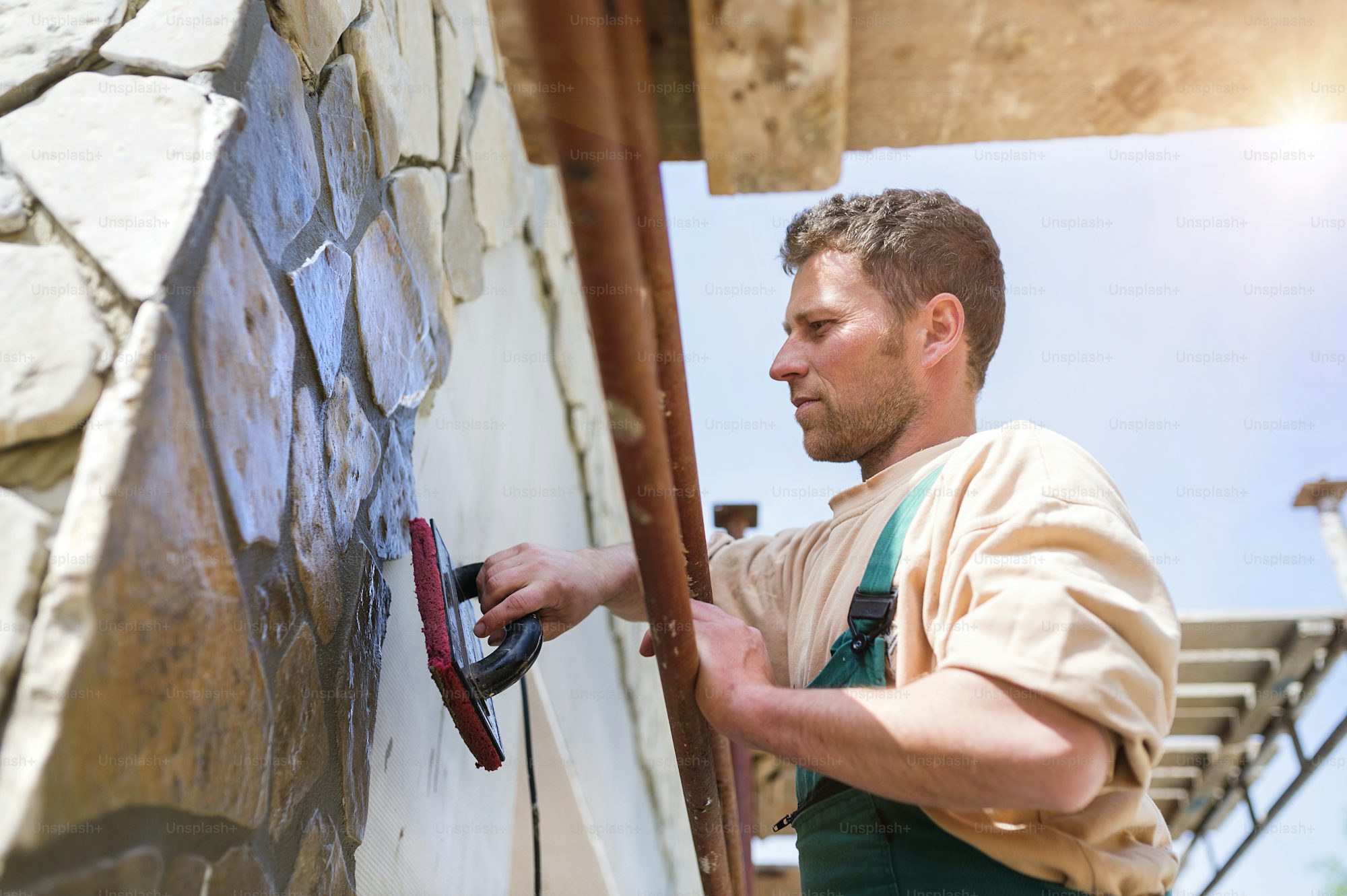 I will install stone veneer and garden walls